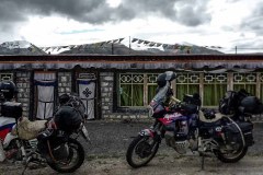 First Tibetan houses and prayser flags