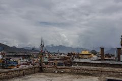 Lhasa rooftops, Potala palace in the distance