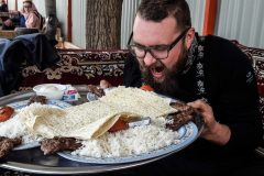 THE Iranian dish: Lamb kebap on a spike served with rice, yogurt, raw onion, tomato and paperthin bread. Usually this comes with a glass of sour cows milk